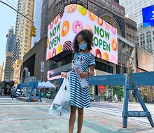 Krispy Kreme brings its trademark glazed doughnuts to the crossroads of the world.