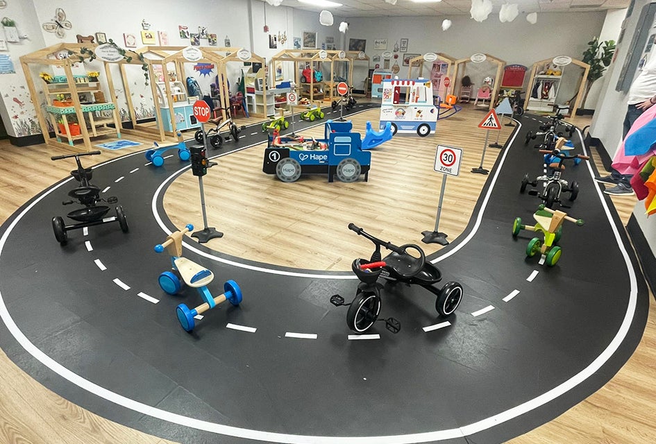 Kids can hop on tricycles and ride around the indoor track at L.I. Salty Kids Cove. 