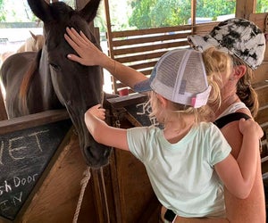 Meet the horses and enjoy a free ride at Happi Farm in Davie. Photo courtesy of the farm