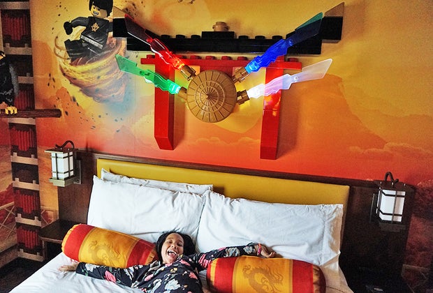 Legoland NY Hotel girl on bed