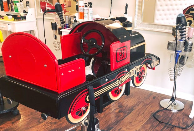 Toddlers will love sitting in a train for their haircut.