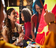 Paint Nite provides paints, canvases, and brushes moms can use to get creative. Photo courtesy of Yaymaker