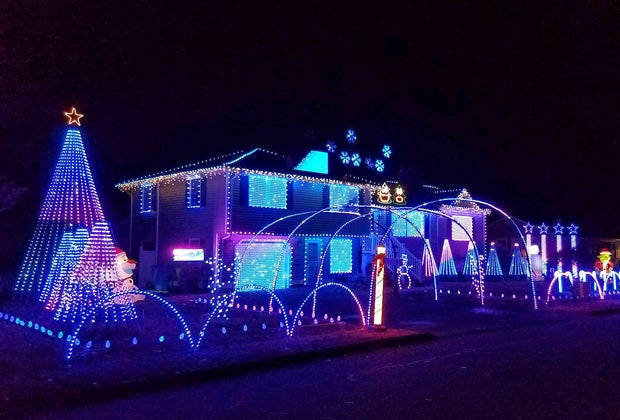 Photo of Connecticut house decked out in Christmas lights.