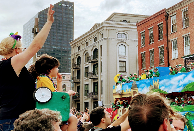 photo of a ladders to help kids get a better view and catch beads at New Orleans Mardi Gras