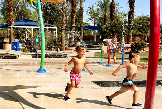kids play and run in the splash pad at the Marriott Shadow Ridge Villas