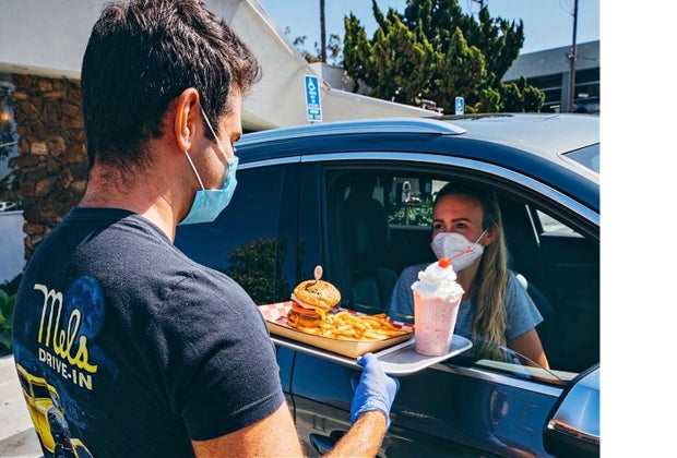 Safe carhop service at Mel's Drive-In.