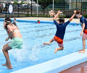 Dive into summer fun at free Boston swimming pools. Mirabella Pool photo courtesy of Boston Centers for Youth & Families