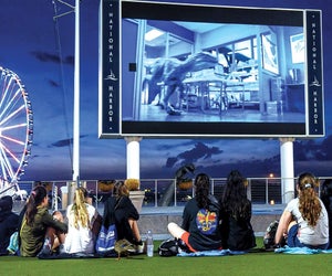 Catch a family-friendly flick along the Potomac River at Movies on the Potomac. Photo courtesy of National Harbor DC on Facebook