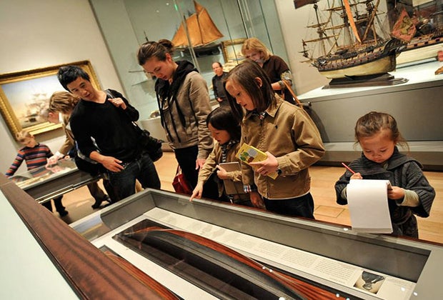 Image of a family seeing exhibits at the MFA.