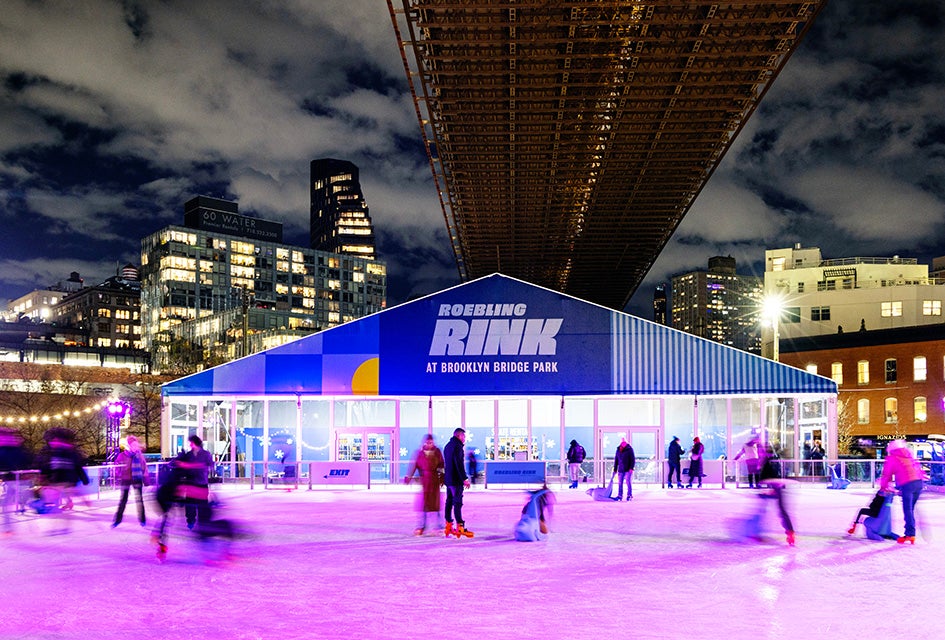 Christmas Weekend 2024 in NYC Top Things To Do: Make Music NYC, BCM Birthday & Hanukkah Skate beneath the historic Brooklyn Bridge while taking in the iconic views of the Manhattan skyline at Roebling Rink. Photo courtesy of venue