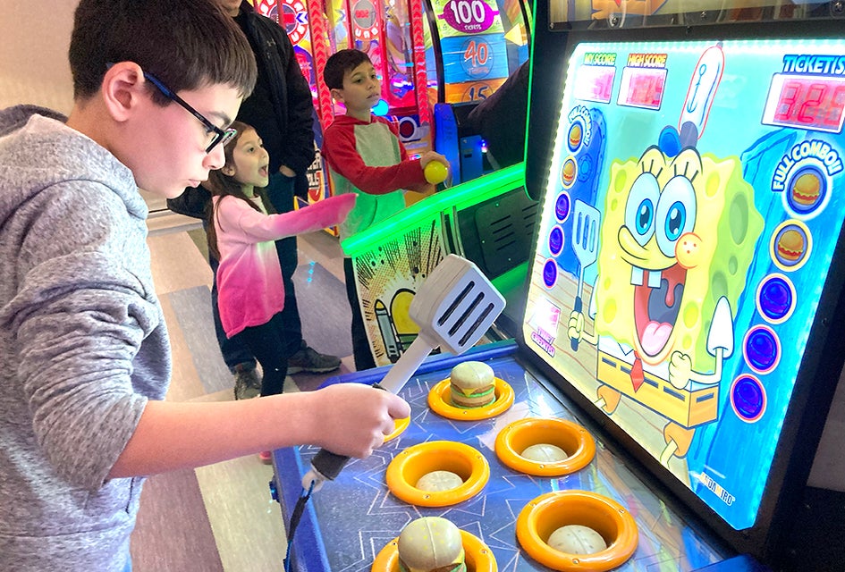 Whack a Krabby Patty on the SongeBob SquarePants game at Fundaes. 