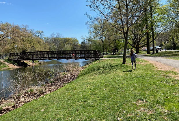 Girl running along a path at Nomahegan Park
