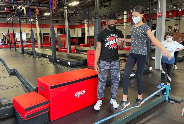 walk a slack line at the Brooklyn Ninja Academy