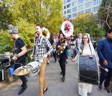 The Dumboween parade features live music and puppets on Halloween. Photo by Ming Fai Chan