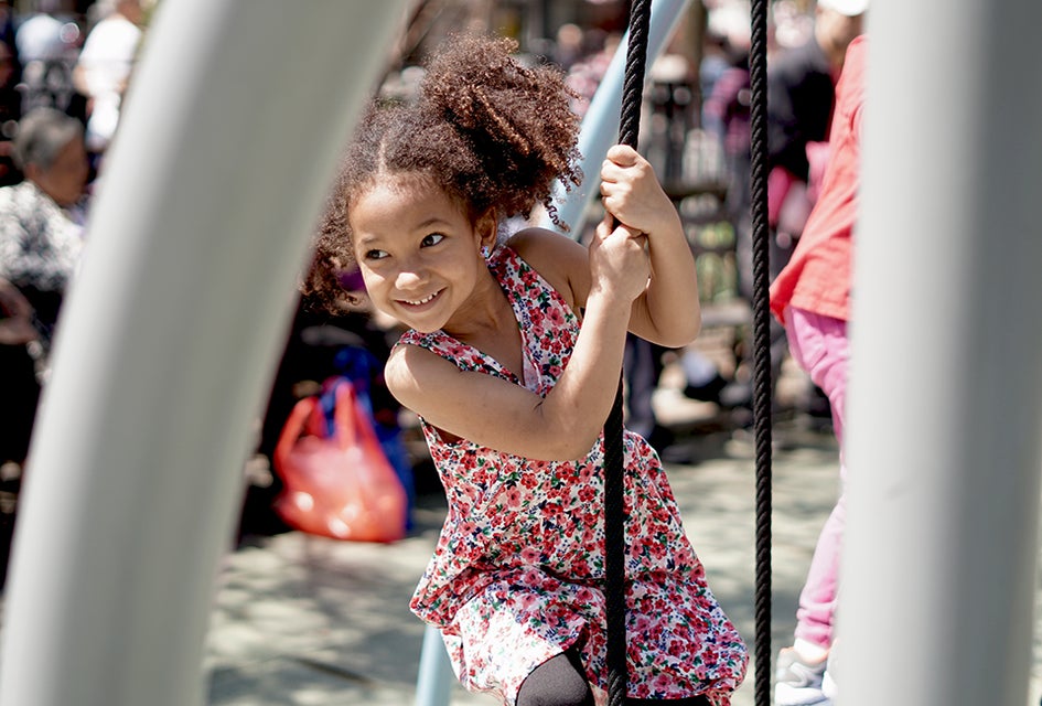 Climb on platforms dangling from ropes at Hester Street Playground. Photo by Jody Mercier