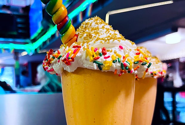 Pride-Themed Desserts in NYC : Ellen’s Stardust Diner Over the Rainbow Milkshake