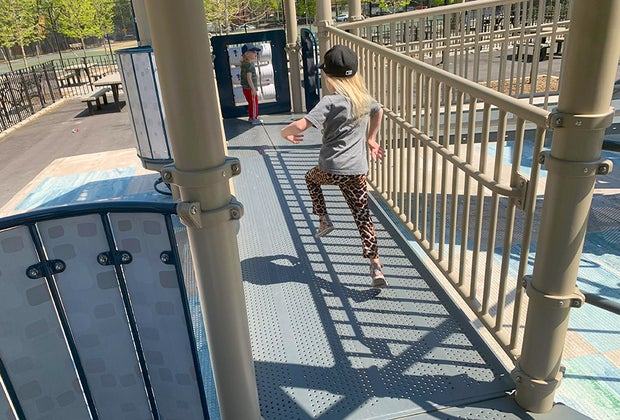 NYC playgrounds: Running on bridge at Ravenswood Playground