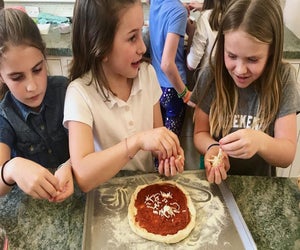 Enjoy a pizza making class at Martina Pizza. Photo courtesy of Sprouts Cooking Club