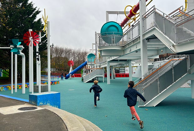 New York Hall of Science Playground: Boys running across the playground