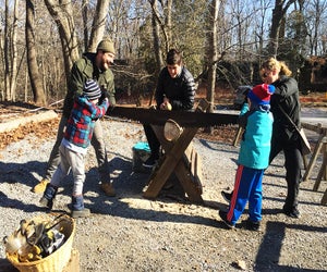 Take part in a log-sawing contest and other old-fashioned fun at the Rye Nature Center on Saturday. Photo by the author