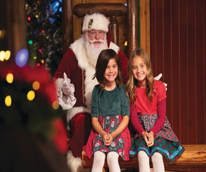 Give Santa a smile at Bass Pro Shops this holiday season and catch it on film. Photo courtesy of the retailer