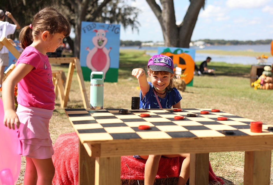 Pig on the Pond is an annual community event featuring carnival rides, kids zone, BBQ, and more! Photo courtesy of the event 