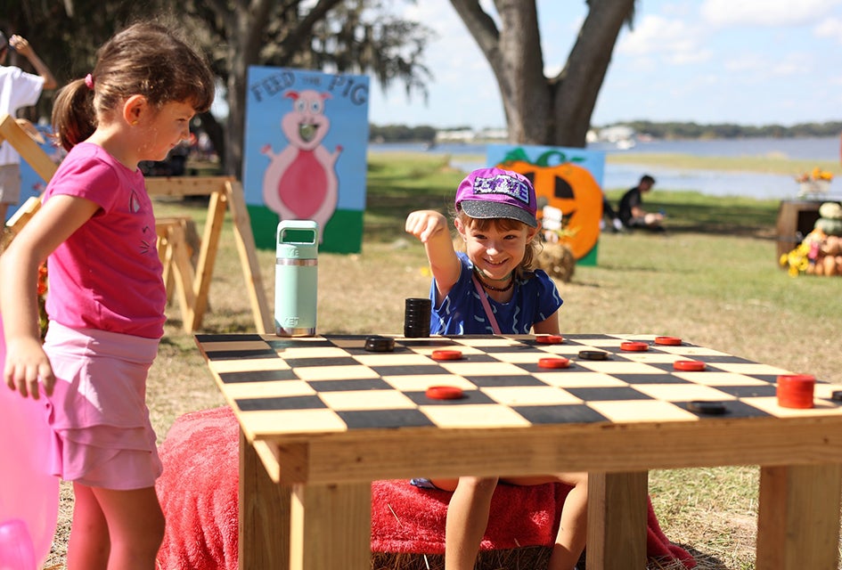St. Patrick's Day Parades and More Best Things to Do in Orlando March 2025 with Kids Pig on the Pond is an annual community event featuring carnival rides, kids zone, BBQ, and more! Photo courtesy of the event
