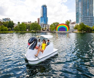 With seating for five, families can take a swan boat ride together on Lake Eola. Photo courtesy of Visit Florida