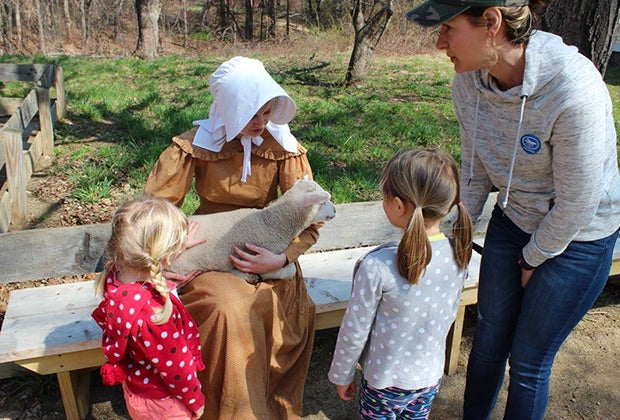 Image of family day trip to Old Sturbridge Village.
