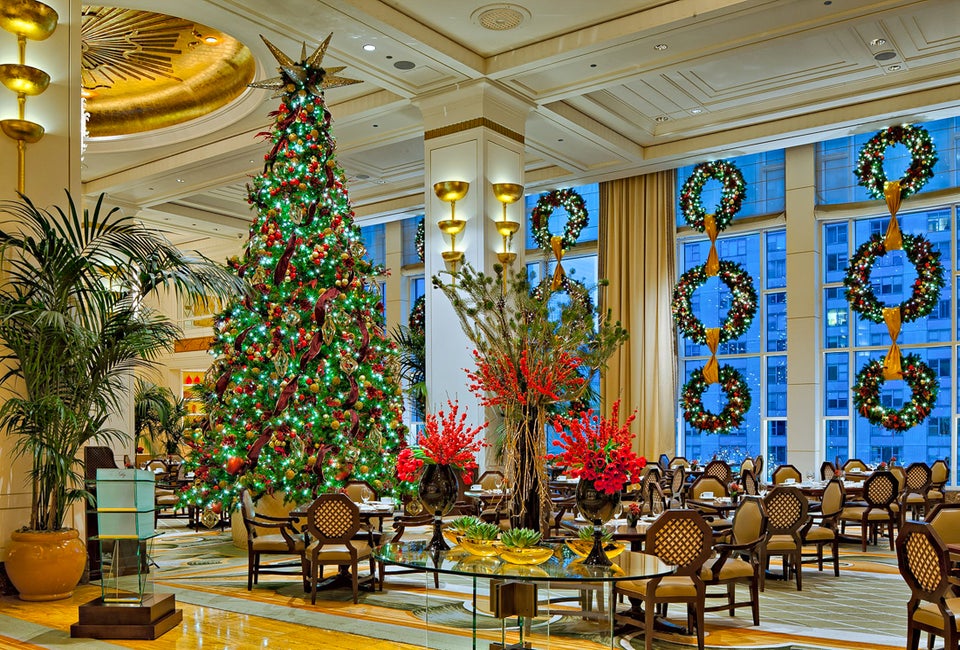 The artfully decorated Peninsula is a wonderful venue for Christmas Eve or Christmas Day dining, Holiday decorations by Kehoe Designs, photography by Mark Segal