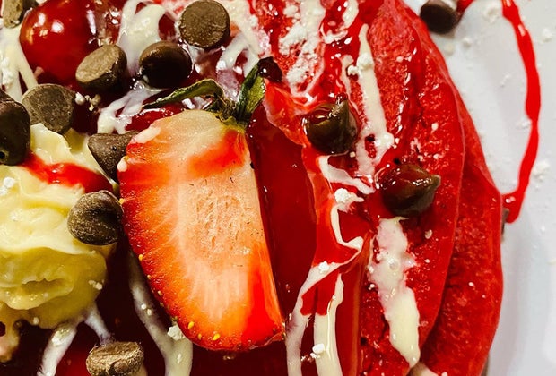 Philly Best Breakfasts Dig into Red Velvet Pancakes with chocolate chips, strawberry compote & sweet buttercream at the Breakfast Boutique.