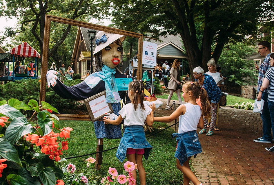 Over 100 scarecrows line the brick pathways of Peddler's Village. during its annual autumn event Scarecrows in the Village. Photo by Chris Burrows