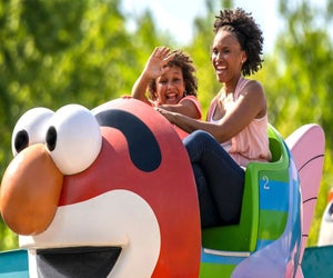 Catch a ride on Elmo for Mother's Day at Sesame Place. Photo courtesy of Sesame Place