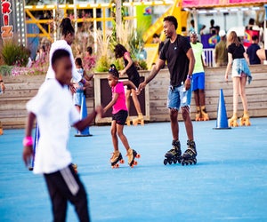 Enjoy roller skating, mini-golf, delicious food, and more at the opening of RiverRink Summerfest. Photo courtesy of Independence Blue Cross RiverRink 