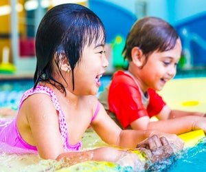 Toddler and baby swimming lessons are offered all throughout the DC area. Photo courtesy of Aqua-Tots Swim Schools 