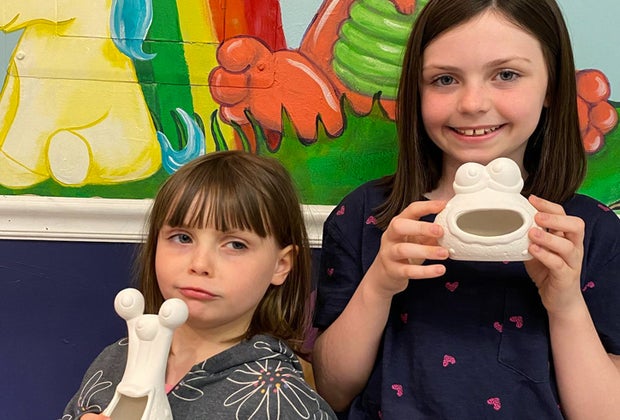 Photo of kids holding pottery - Heat Wave Hot List