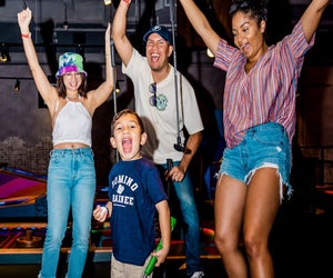 Heat waves, flurries, or rainy days aren't a problem with the top spots for indoor mini golf in Boston! Photo courtesy of Puttshack