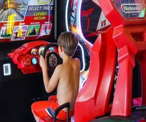 Buckle up for video games, ice hockey, and more indoor fun at the best arcades in Boston! Photo courtesy of the Paragon Facebook page