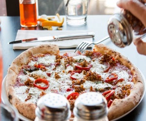 Treat your little princess to pizza with a princess this weekend. Photo courtesy of The Neapolitan Pizza Company