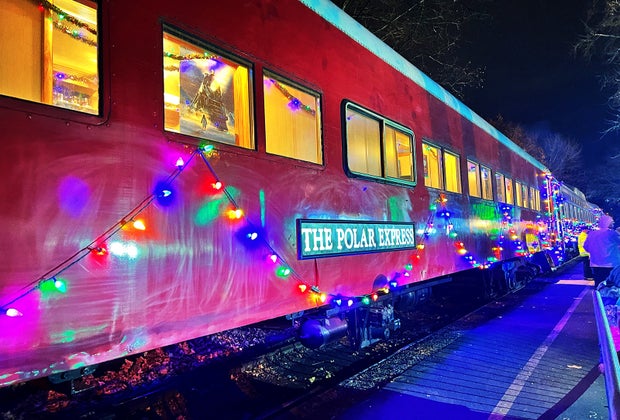 The Polar Express train cars are all dressed up for the Christmas season.
