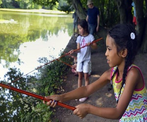 Join Prospect Park Alliance for the popular summer program Macy's Fishing Clinic, where families can go fishing in Brooklyn's Backyard. Photo courtesy of the Prospect Park Alliance