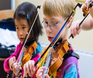 Kids' music classes expose them to new skills, experiences, and friendships. Photo courtesy of Powers Music School