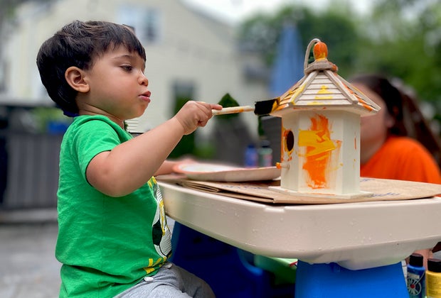 paint a birdhouse and fill it with seeds
