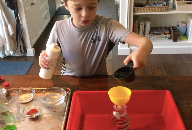 A funnel helps with pouring the ingredients into the bottle.