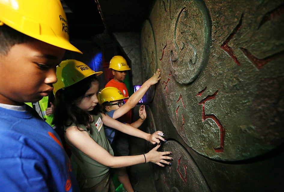 Kids embark on a quest at Ripley's Relic in Times Square. Photo by Stuart Ramson/AP Images