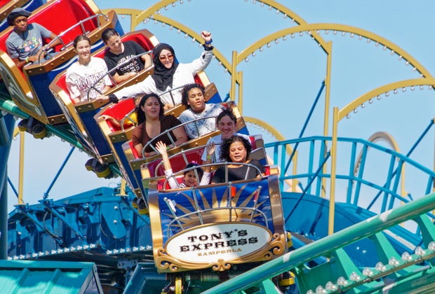 excited kids ride Tony's Express ride at Luna Park, opening soon for summer 2025