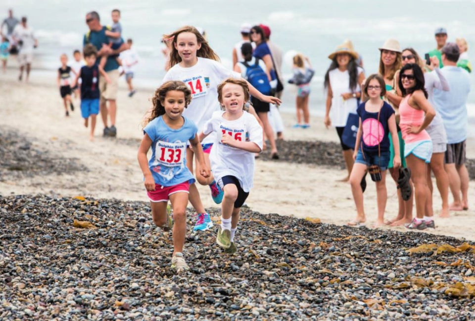 Celebrate the sea with a fun Dolphin Dash. Photo by Steve Taylor courtesy of the San Clemente Ocean Festival
