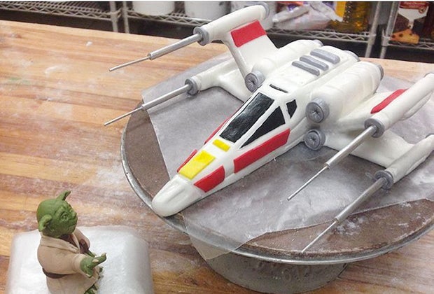 Crafting the topper on a Star Wars cake at Sweet Sweet Sue's.