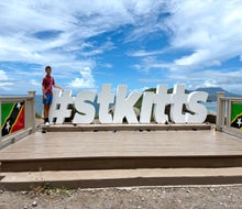 Your family and followers will know exactly where you're vacationing when you send them a pic at the St. Kitts sign at the Timothy Hill Overlook.