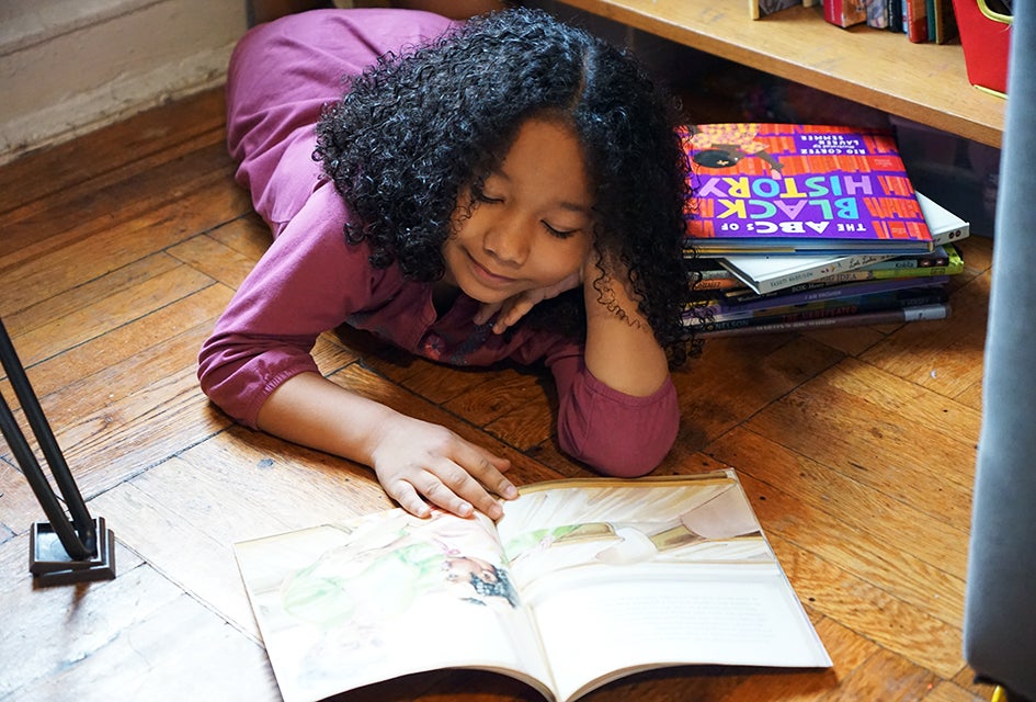 Create a special cozy area where your child relax with a book. Photo by Jody Mercier